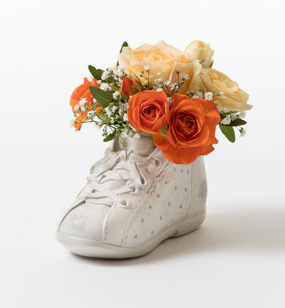 Gylne blomster i babysko Gylne blomster i babysko